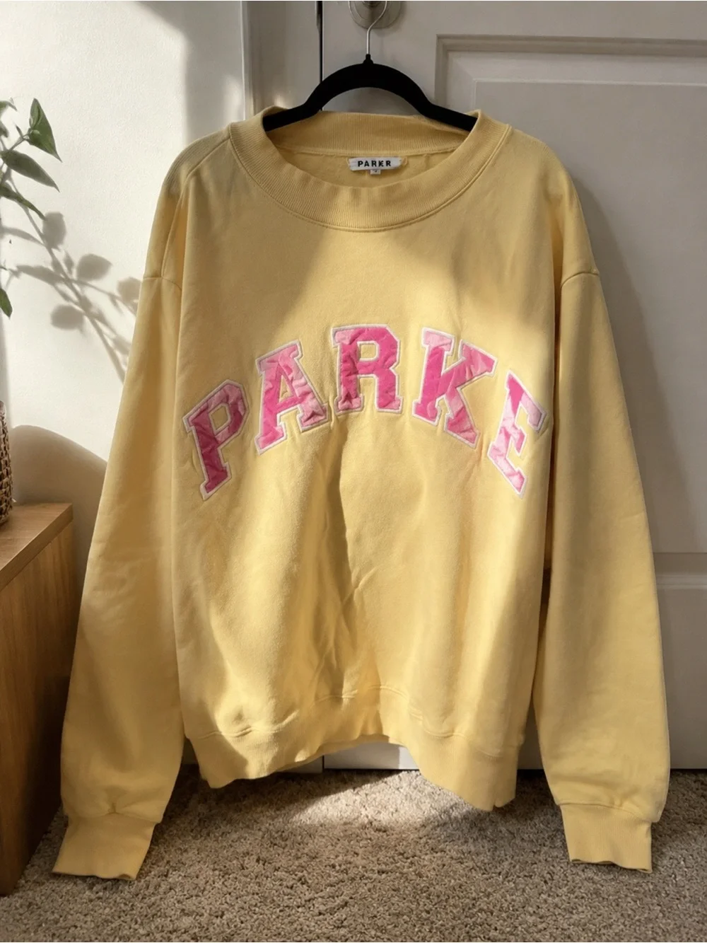 PARKI Pastel Yellow Crewneck Sweatshirt with Pink Appliqué